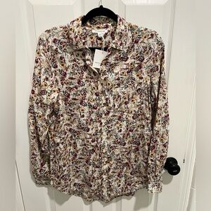 Women’s button down shirt.